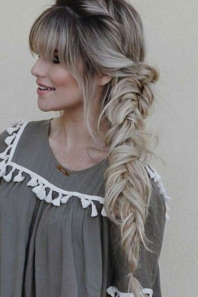27 Cowgirl Hairstyle Ideas That Feel Modern, Effortless, and 2026-Ready 27 braided-bangs-with-loose-hair