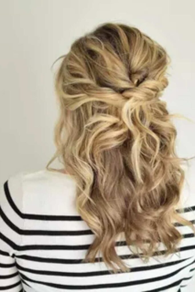 29 Flattering Medium Length Hairstyles for Women Over 50 in 2026 7 Half Up Twist for Soft Volume