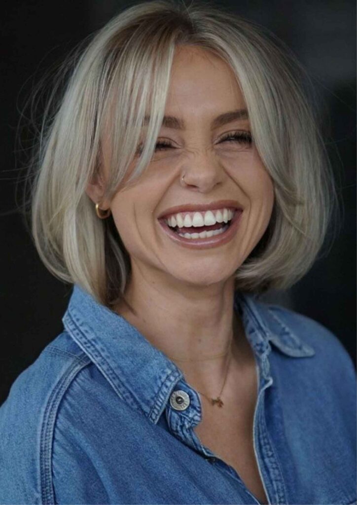 47Hairstyles for Women Over 40 With Bangs Modern, Youthful & Effortlessly 7 Chin Length Bob With Blunt Bangs